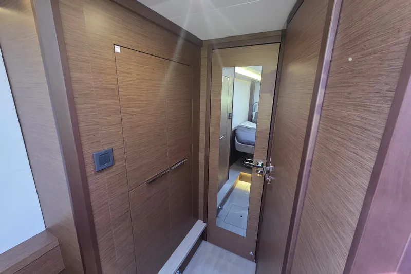 Slide: The Image of Port Forward Cabin Hanging Locker, Entrance Head w/ Shower - 36