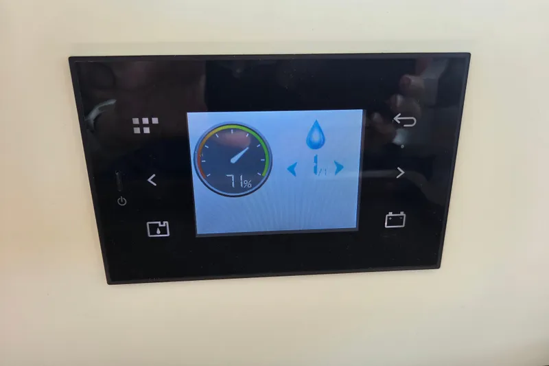 Slide: The Image of Touchscreen control panel on Lagoon 46 yacht, displaying water level at 71%. - 24