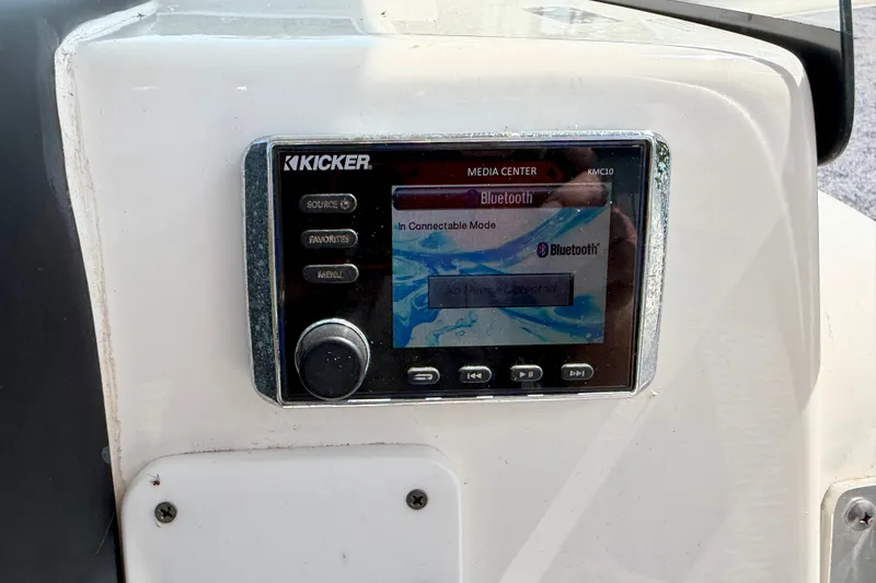 Slide: The Image of Kicker media center with Bluetooth on 2017 Sea Fox 266 Commander boat dashboard. - 17