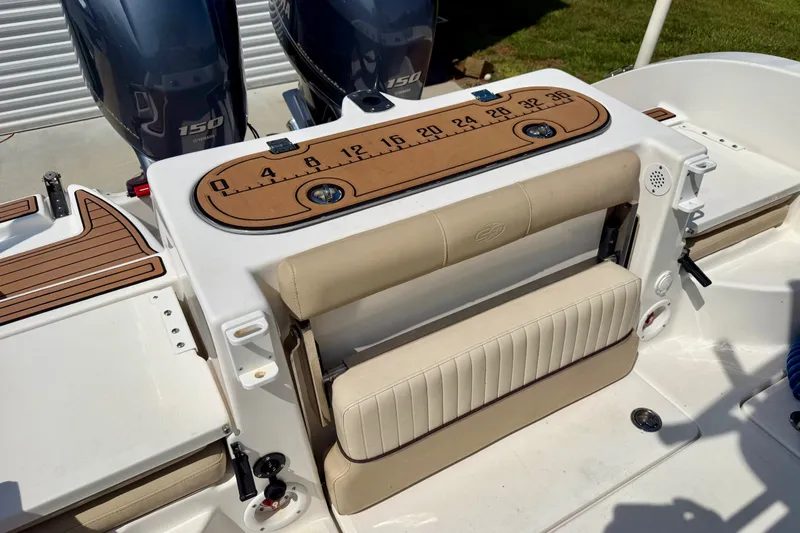 Slide: The Image of 2017 Sea Fox 266 Commander boat with dual 150 engines and cushioned seating. - 21