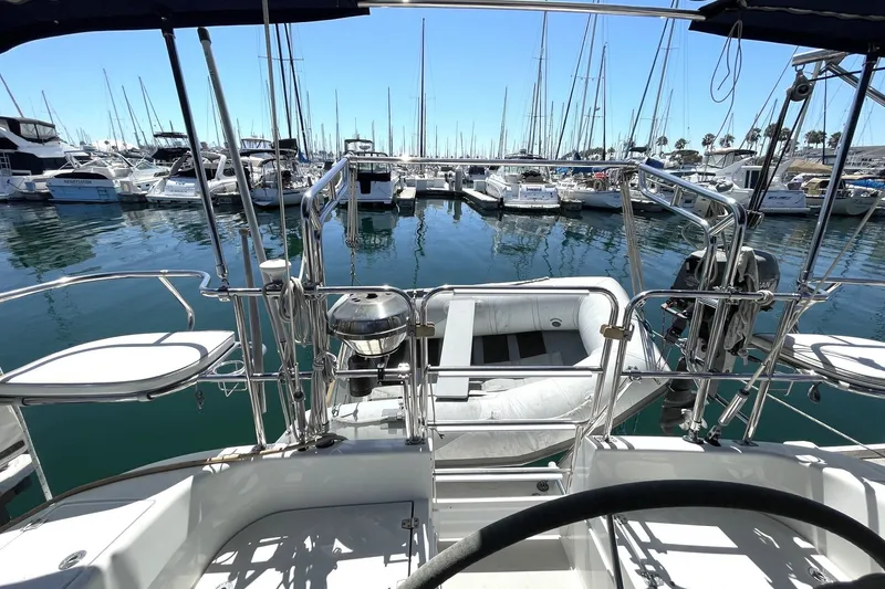 Slide: The Image of Cockpit view of a 2004 Catalina 350 sailboat docked in a marina. - 22