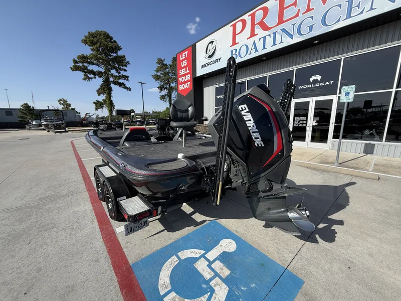 Slide: The Image of A 2018 Falcon F205 is parked outside a boating center. - 12