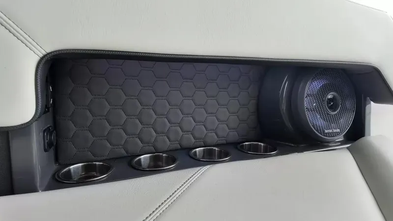 Slide: The Image of Interior of the 2026 Cobalt R4 Surf with speaker and cup holders. - 47