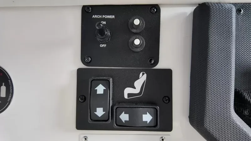 Slide: The Image of Close-up of control knobs and switches on a boat. - 24
