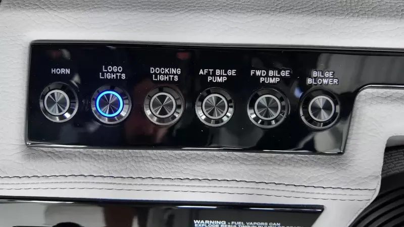 Slide: The Image of Close-up of a control panel area with six buttons for various boat controls. - 18