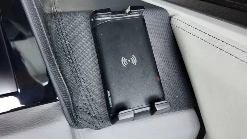 Slide: The Image of A wireless charger is integrated into the armrest of a 2026 Cobalt R4 Surf. - 22