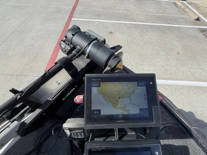 Slide: The Image of A 2018 Falcon F205 featuring a Garmin navigation system and a Minn Kota trolling motor. - 31