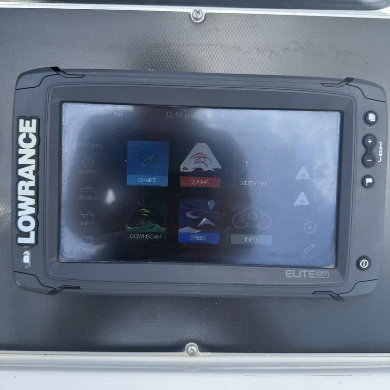 Slide: The Image of A Lowrance Elite GPS and sonar system is installed on a boat. - 31