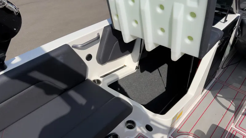 Slide: The Image of The image shows the interior of a 2021 MasterCraft NXT24 boat with black seating. - 5