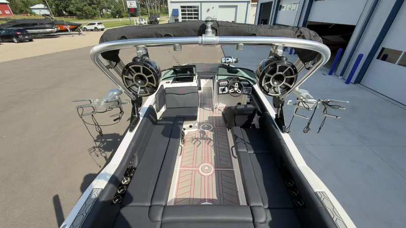 Slide: The Image of Interior view of a 2021 MasterCraft NXT24 with modern seating and speakers. - 22