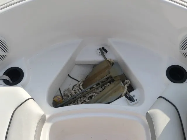 Slide: The Image of The bow area of a 2018 Yamaha AR190 boat with anchor and ropes. - 15