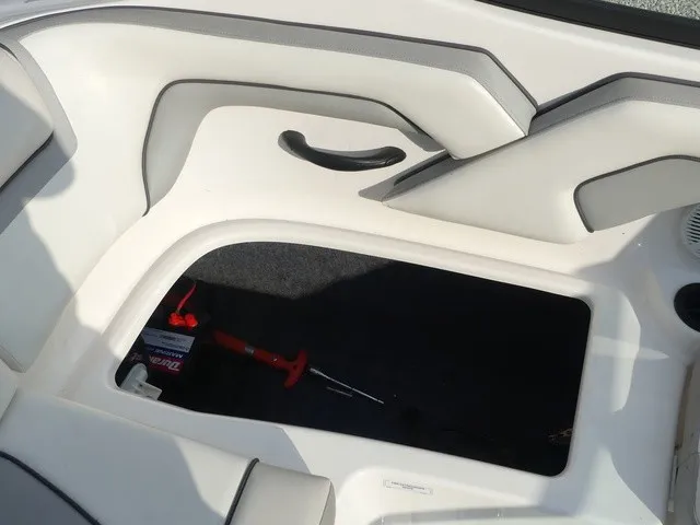 Slide: The Image of Interior of a 2018 Yamaha AR190 with white upholstery and storage space. - 25