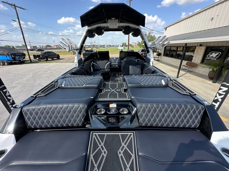 Slide: The Image of The image shows the interior of a 2024 Tigé 22RZX boat with luxurious seating and modern details. - 11