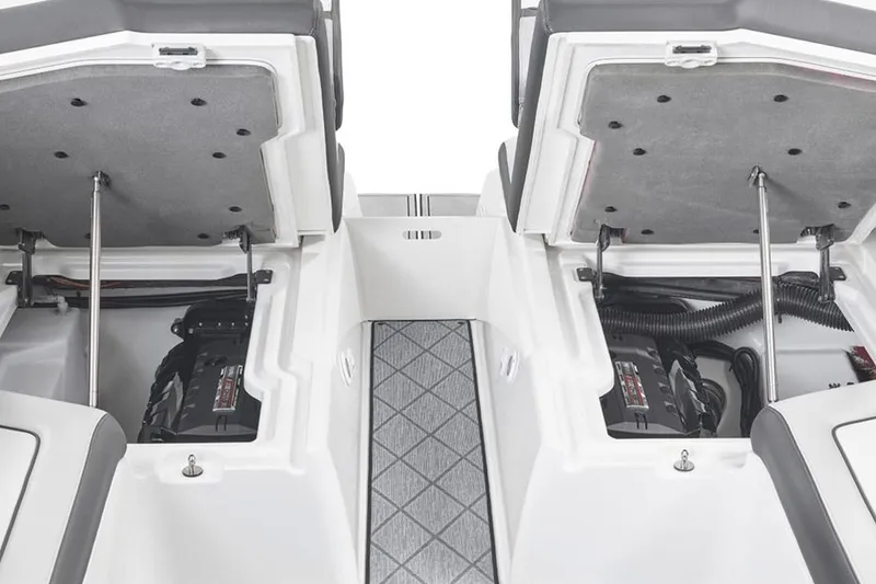 Slide: The Image of Manufacturer Provided Image: 2020 Yamaha Boats 275SD engine compartments with open hatches, showcasing internal components. - 17
