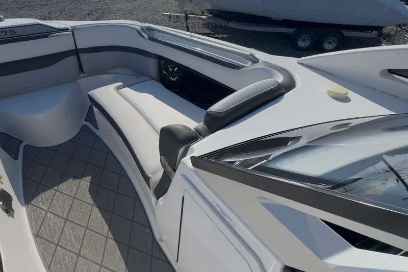 Slide: The Image of 2020 Yamaha Boats 275SD interior with sleek seating and modern design. - 16