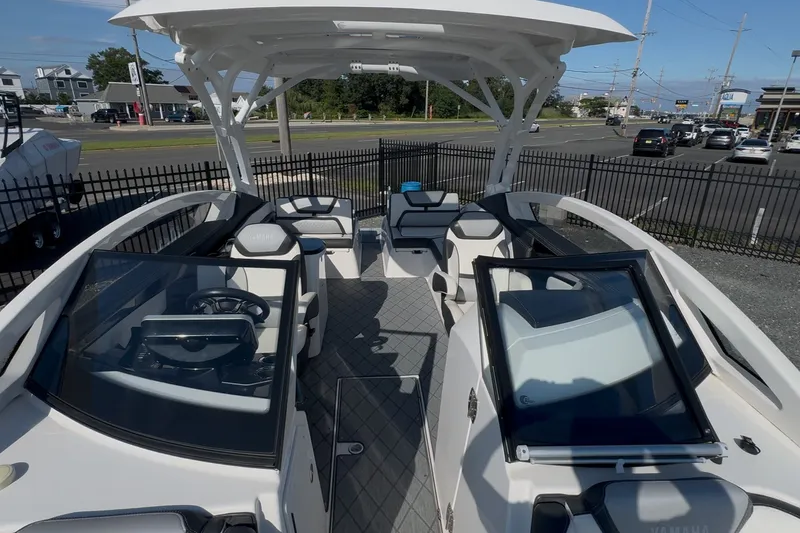 Slide: The Image of 2020 Yamaha Boats 275SD interior view, showcasing sleek seating and modern design. - 18