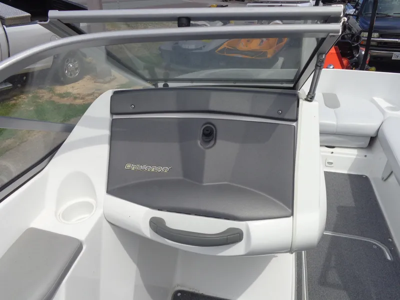 Slide: The Image of The image shows the cockpit of a Sea-Doo sport boat with gray and white accents. - 11