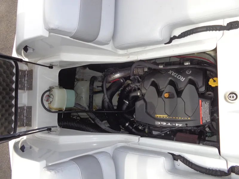 Slide: The Image of The engine compartment of a 2008 Sea-Doo Sport Boats 180 Challenger with a Rotax 4-TEC engine. - 31