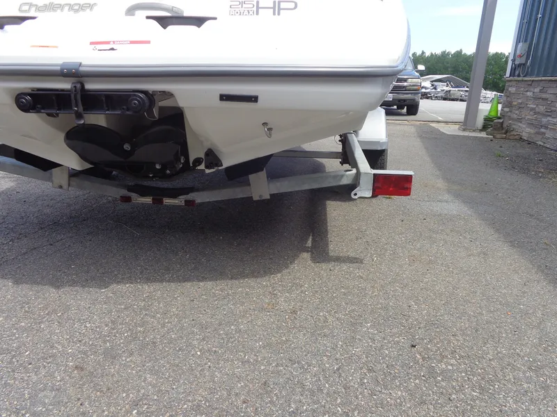 Slide: The Image of The image shows the rear of a Sea-Doo sport boat on a trailer. - 41