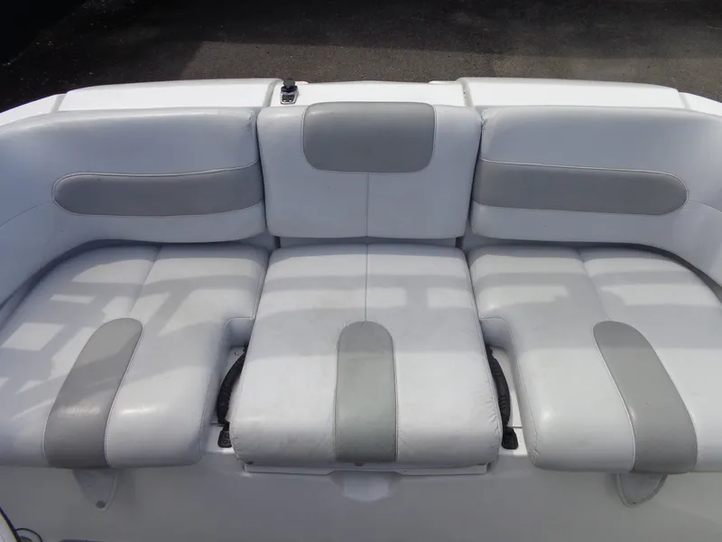 Slide: The Image of The rear seat of a 2008 Sea-Doo Sport Boats 180 Challenger with white and gray upholstery. - 18