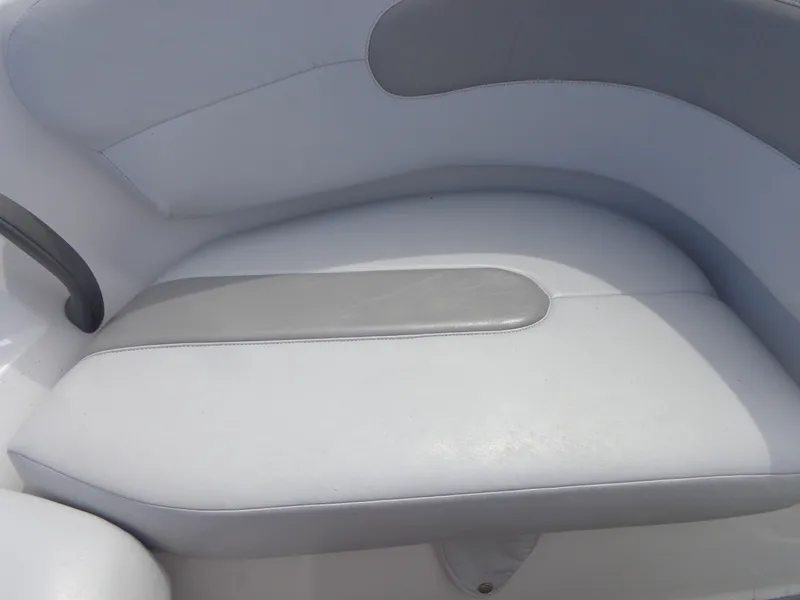 Slide: The Image of A white and gray seat on a 2008 Sea-Doo Sport Boat, model 180 Challenger. - 23