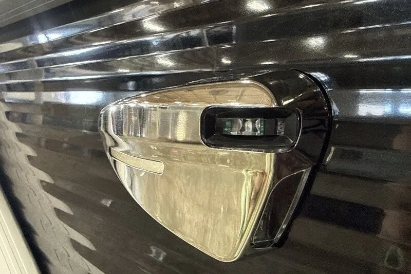 Slide: The Image of Close-up of 2027 Bennington S1 20 Cruise boat detail, featuring sleek metallic design. - 18