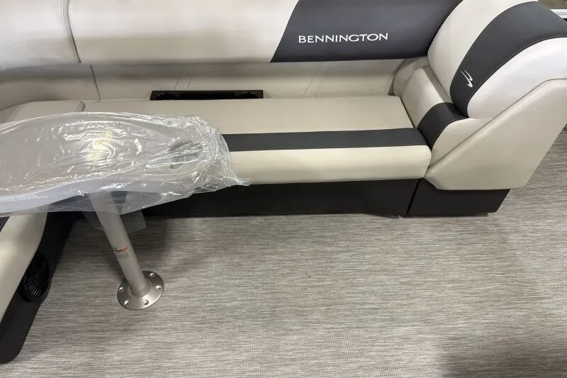 Slide: The Image of 2027 Bennington S1 20 Cruise boat interior with cushioned seating and table. - 14