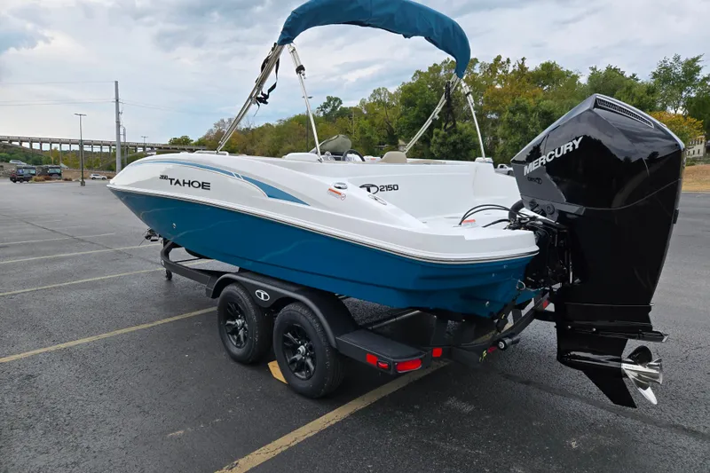 Slide: The Image of 2027 Tahoe 2150 boat with Mercury engine on trailer in parking lot. - 5