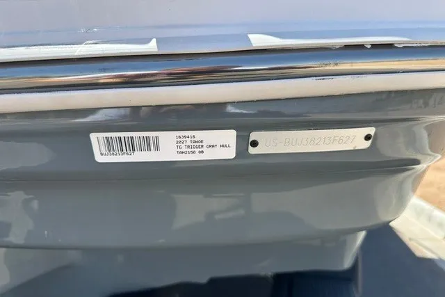 Slide: The Image of 2027 Tahoe 2150 boat hull with identification labels and serial number. - 22