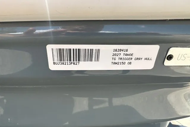 Slide: The Image of Barcode label on 2027 Tahoe 2150 boat with gray hull identification details. - 23