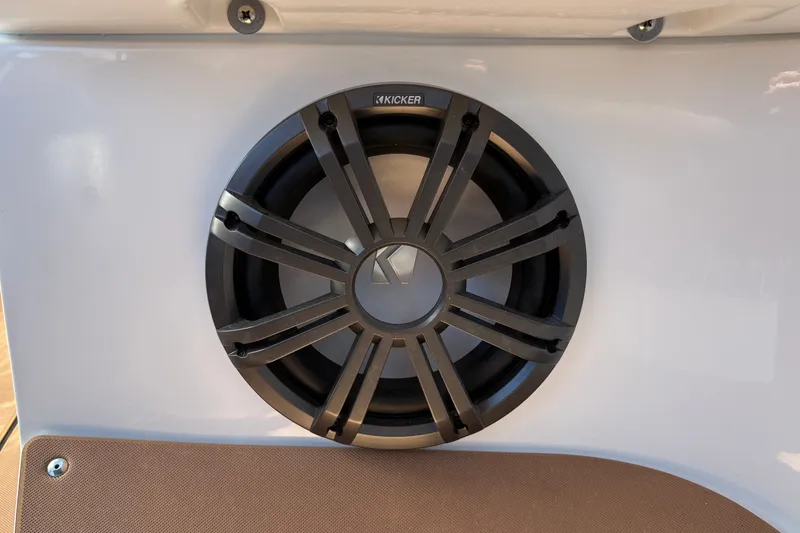 Slide: The Image of Kicker speaker installed on 2027 Tahoe 210 S boat, enhancing audio experience. - 46
