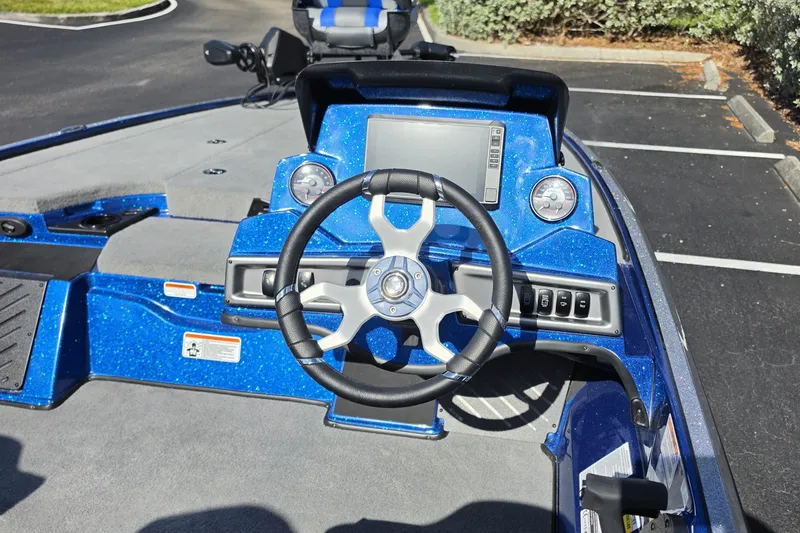 Slide: The Image of Steering console of a 2027 Nitro Z18 XL Pro boat, featuring a modern dashboard. - 14