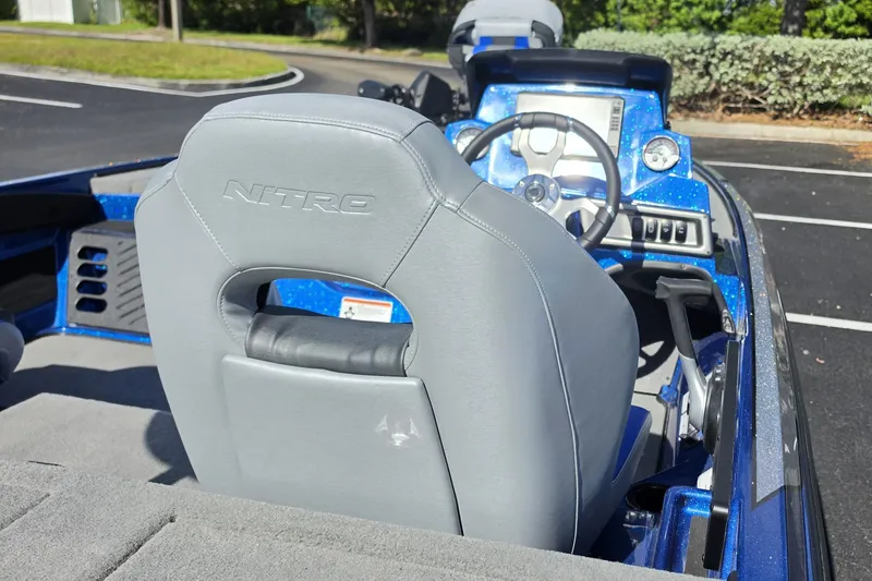 Slide: The Image of 2027 Nitro Z18 XL Pro boat interior with steering wheel and dashboard. - 13