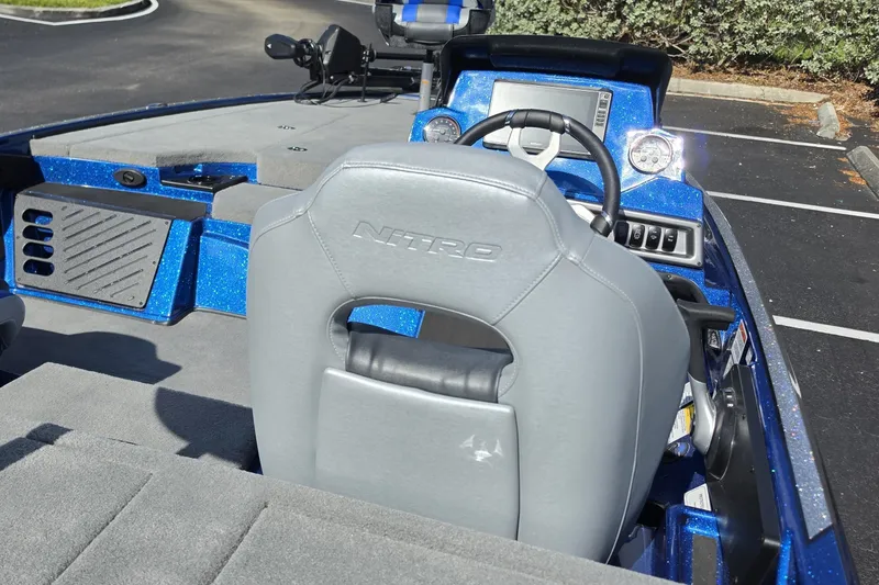 Slide: The Image of 2027 Nitro Z18 XL Pro boat interior with steering wheel and dashboard. - 15
