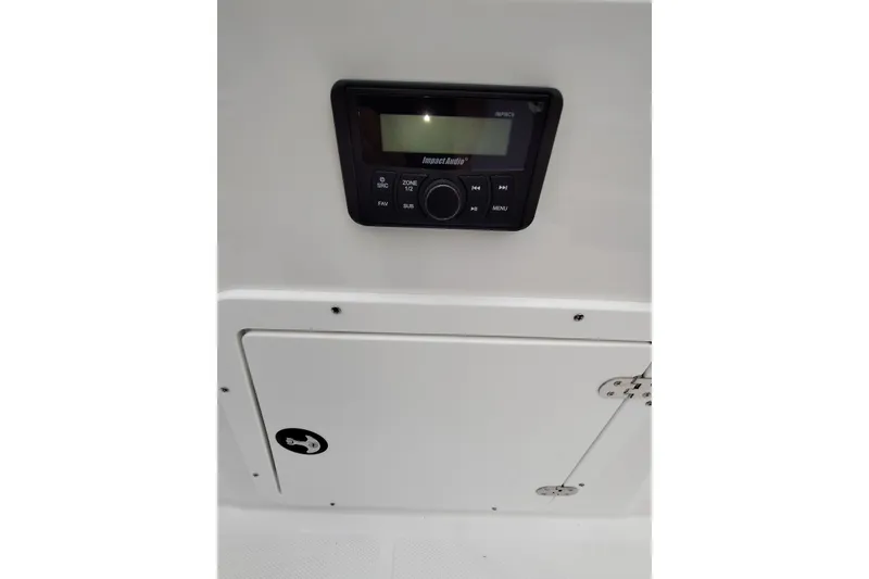 Slide: The Image of Audio control panel on 2027 Tahoe 2150 boat, featuring a sleek design. - 10