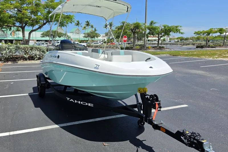 Slide: The Image of 2027 Tahoe T16 boat on trailer in sunny parking lot. - 3
