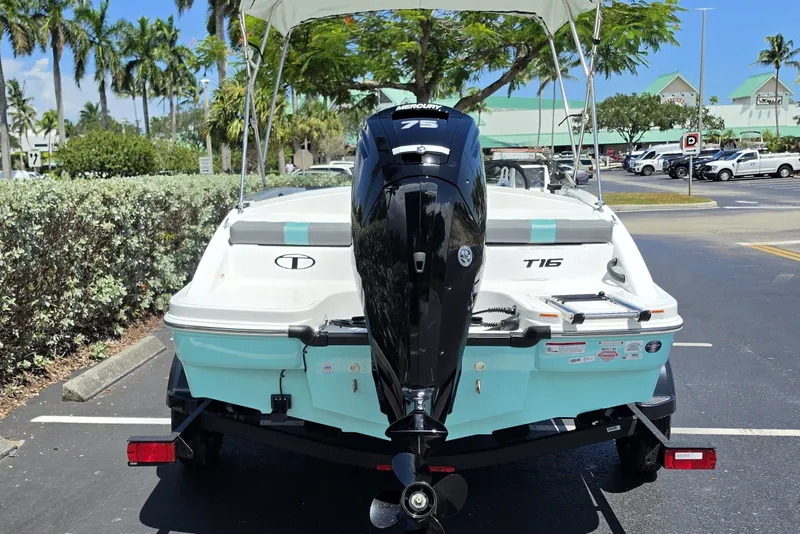 Slide: The Image of 2027 Tahoe T16 boat with Mercury 75 engine in parking lot. - 12