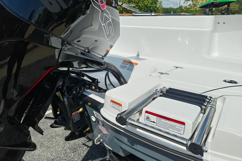 Slide: The Image of 2027 Tahoe 1950 boat stern with motor and swim ladder. - 116