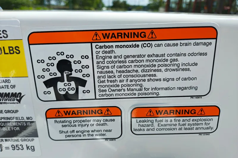 Slide: The Image of Warning labels on Tahoe 1950 model, highlighting carbon monoxide and fuel hazards. - 126