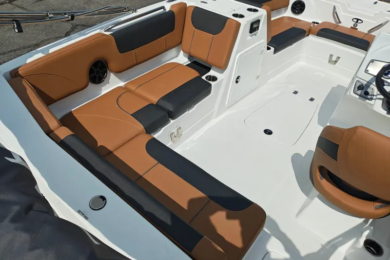Slide: The Image of Luxurious interior of 2027 Tahoe 1950 boat with brown and black seating. - 119