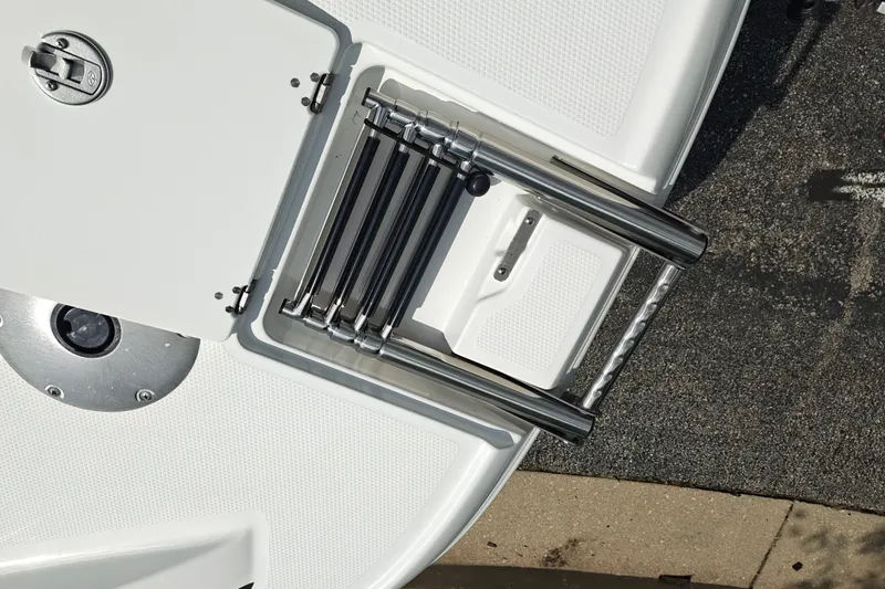 Slide: The Image of 2027 Tahoe 1950 boat ladder and hatch detail, showcasing sleek design and functionality. - 139
