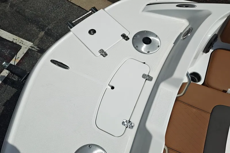 Slide: The Image of 2027 Tahoe 1950 boat deck with storage compartments and seating. - 137