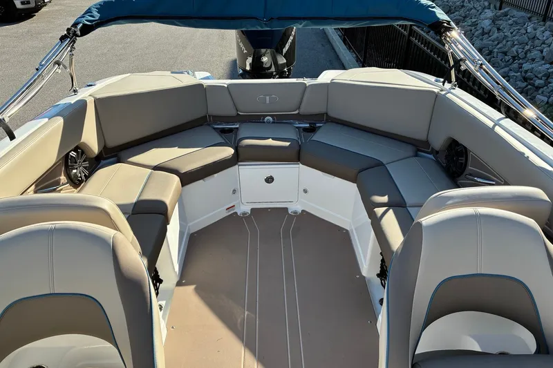 Slide: The Image of Interior of 2027 Tahoe 210 S boat with spacious seating and modern design. - 12