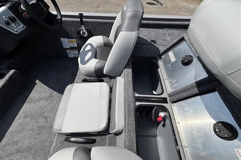 Slide: The Image of 2027 Tracker Pro Team 195 boat interior with gray seating and storage compartments. - 20