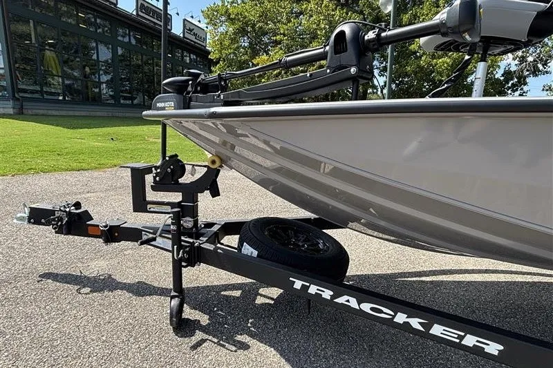 Slide: The Image of 2027 Tracker Pro Team 195 boat on trailer, parked outdoors. - 22