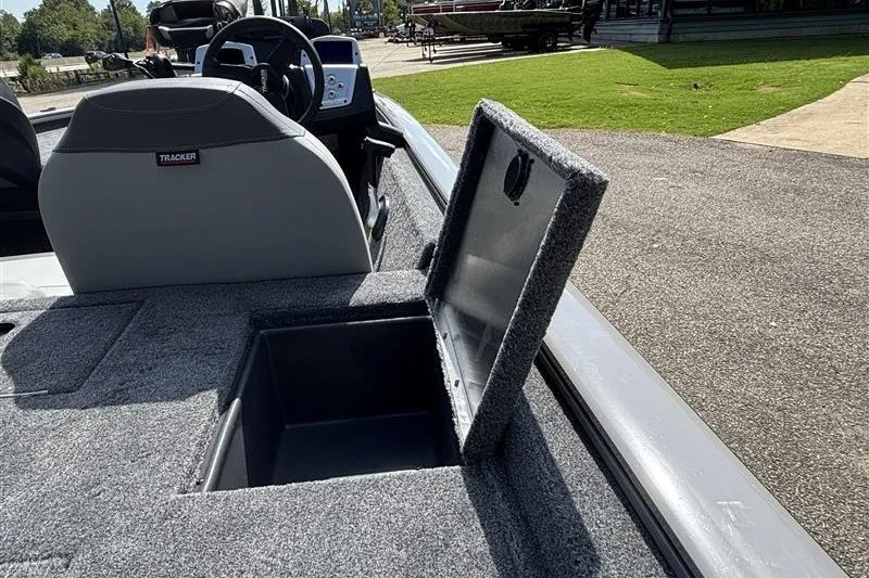 Slide: The Image of 2027 Tracker Pro Team 195 boat interior with open storage compartment. - 21