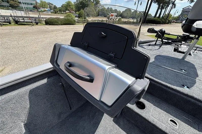 Slide: The Image of 2027 Tracker Pro Team 195 boat interior with storage compartment and seating area. - 17