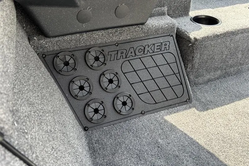Slide: The Image of Interior of 2027 Tracker Pro Team 195 boat with speaker panel and cup holder. - 18
