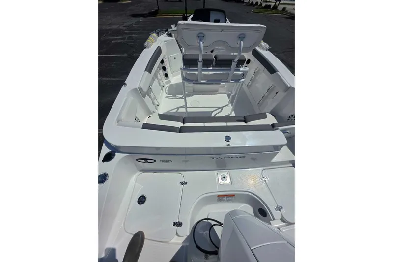 Slide: The Image of 2027 Tahoe 2150 CC boat interior with seating and storage compartments. - 10