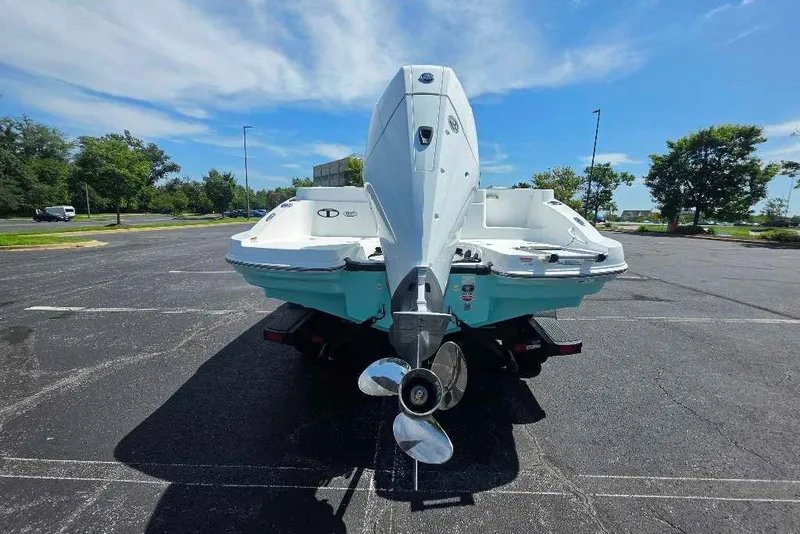 Slide: The Image of 2027 Tahoe 2150 CC boat on trailer in parking lot, sunny day. - 3